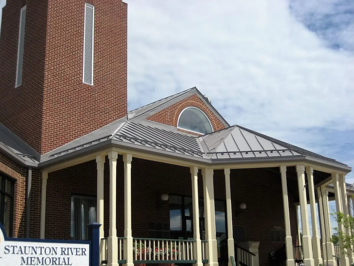 Skilled roofing craftsmen working on a residential roof in Steelton
